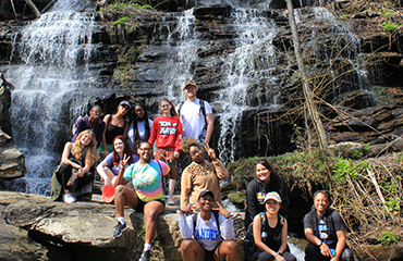 students at waterfall